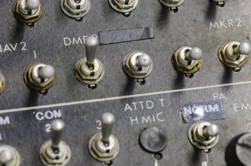 Communications control panel in an old airplane.