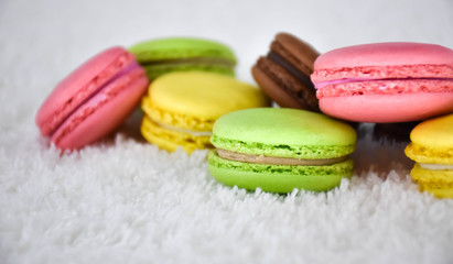 colorful macaroons on white background