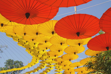 Yellow, Red Paper Umbrellas Decoration as Background
