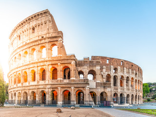 Colosseum, or Coliseum. Morning sunrise at huge Roman amphitheatre, Rome, Italy. - obrazy, fototapety, plakaty