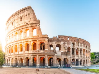 Foto op Canvas Colosseum, or Coliseum. Morning sunrise at huge Roman amphitheatre, Rome, Italy. © pyty