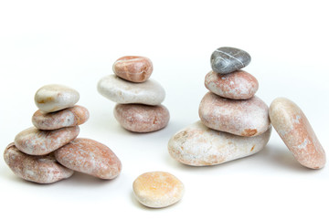 Small colorful sea stones, isolated on white. Top view with copy space.