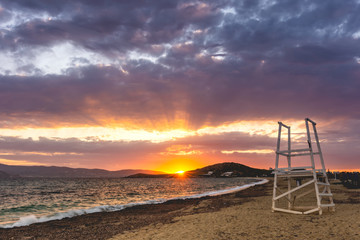 Sunset behind the Cyclades at Agios Prokopios beach, Naxos, Greece