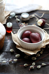 Easter still life with cake on a dark wooden background