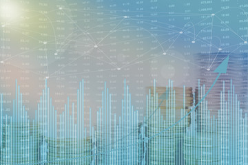 Double exposure of city, Stock market and graph on rows of coins for finance and banking , investments, trading, chart, Digital economy concept.