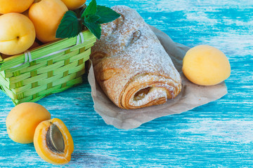 Apricots in the basket and baked goods