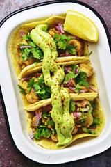 Chicken tacos with coriander, red onion and guacamole