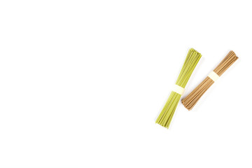 Assortment of asian soba, green tea noodles isolated on white background.Copy space for Text.Minimalist concept.Top View. Flat Lay.