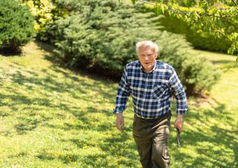 Portrait of Senior man in the garden.