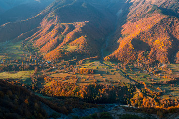 colorful trees in the mountains of Svaneti in the fall. Beautiful landscape