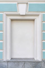 white closed window in a beautiful building