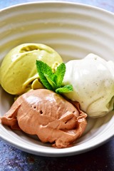 Gluten free, dairy free and sugar free banana ice cream. Matcha, vanilla and chocolate banana ice cream scoops