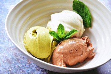 Gluten free, dairy free and sugar free banana ice cream. Matcha, vanilla and chocolate banana ice cream scoops