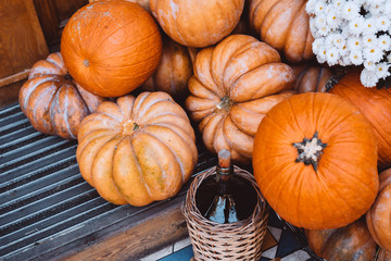 Autumn decoration with pumpkins and flowers on a street in a European city