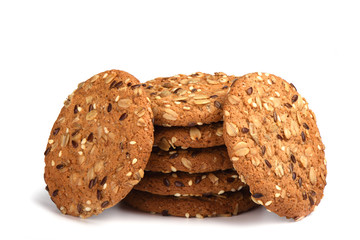 Oatmeal cookies with cereals isolated on white background. Sweet dessert.