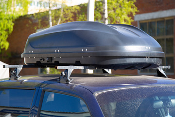 Luggage on the roof of the car. Shipping by car.