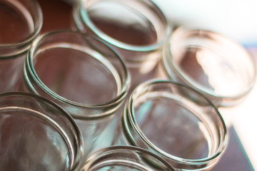 many transparent glasses grouped with lots of warm and cold light