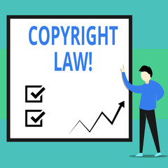 Conceptual hand writing showing Copyright Law. Concept meaning body of law that governs the original works of authorship