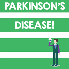 Text sign showing Parkinson S Is Disease. Business photo text nervous system disorder that affects movement Businessman Looking Up, Holding and Talking on Megaphone with Volume Icon