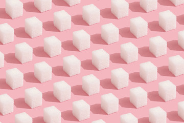 Abstract Pattern made of sugar cubes on pink Minimal style background