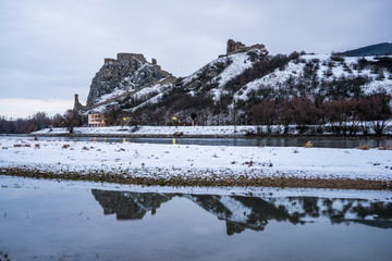 Snow Covered Devin Castle Ruins above the Danube River in Bratislava, Slovakia in the Morning