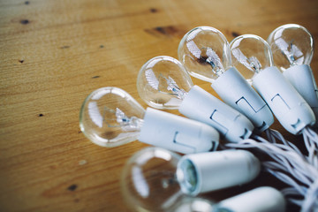 Led bulbs technology on a wooden background