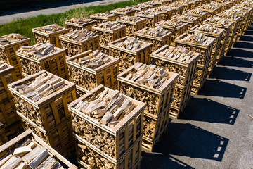 Rows of firewood stacked on pallets seen from above - 269296288