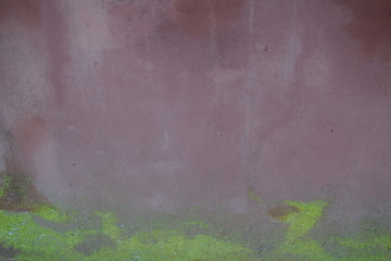 Vintage surface of old shabby wall with falling off plaster, beige-brown shades, background, texture