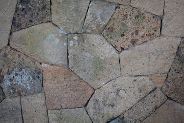 Closeup of tufa wall, irregular stone