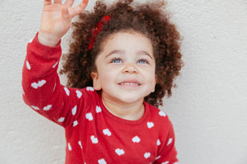 ethnic little kid with amazing blue eyes