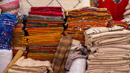 Traditional african arabian moroccan marrakech carpet market, shop with carpets and textile...