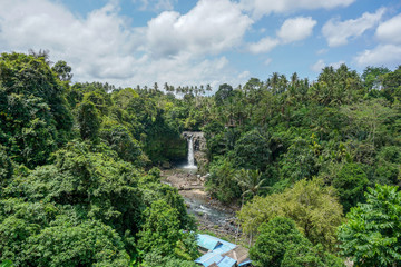 Fototapeta na wymiar Tegenungan Waterfall is a popular destination for tourists visiting Bali, Indonesia.