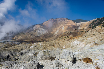 A landscape of rocky track on mount Papandayan that challenging for the hiker. The most active...