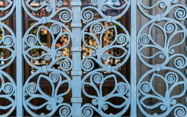 Pattern of iron gate in English vintage style. Picture is in vintage tone.