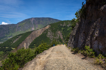 A rocky track on papandayan with gorgeous lanscape on the background. Papandayan Mountain is one of the favorite place to hike on Garut.