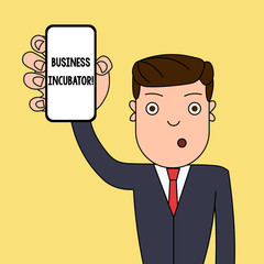 Writing note showing Business Incubator. Business concept for company that helps new and startup companies to develop Man Holding Vertical Smartphone Device Screen for Attention
