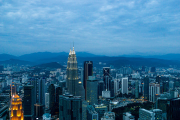 View over the cityscape of Kuala Lumpur at dusk from the KL Menara Tower in KL, Malaysia