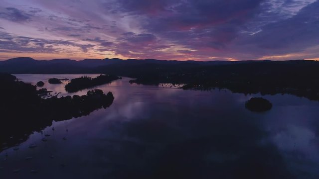 Drone Dark Lake Tight to Left Hill Silhouette, Windermere Sunrise Lake District