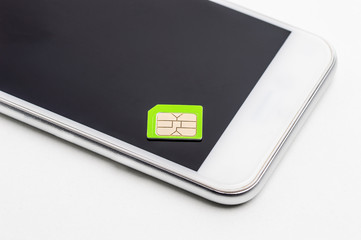 High angle shot of smart phone use with micro sim card with black screen