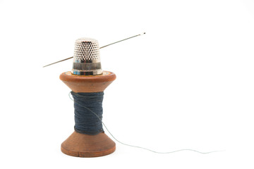 sewing supplies, wooden spool with thread