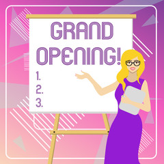 Text sign showing Grand Opening. Business photo showcasing held to mark the opening of a new business or public place White Female in Glasses Standing by Blank Whiteboard on Stand Presentation