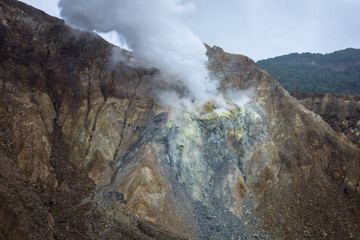 view of crater on active mountain with sulfur gas come out from stone. Beautiful landscape of mount Papandayan. Papandayan Mountain is one of the favorite place to hike on Garut.