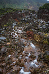 Rocky stream with clear water on a mountain. Beautiful landscape of mount Papandayan. Papandayan Mountain is one of the favorite place to hike on Garut. © Ivan