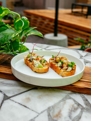 Delicious bruschetta with a variety of fillings.