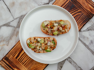 Delicious bruschetta with a variety of fillings.