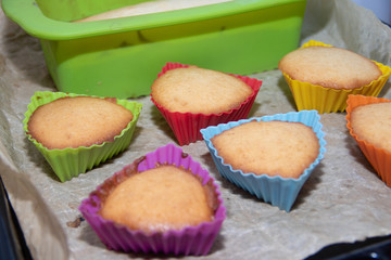 Silicone homemade muffins on parchment. Homemade baking. Sponge cake