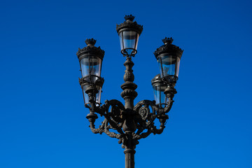 Fototapeta na wymiar Old street lamp in Santander, Spain
