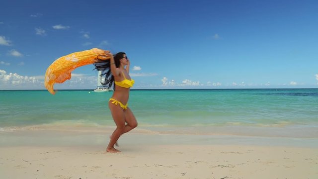 Beautiful young woman enjoying her summer holiday in Punta Cana resort, Dominican Republic