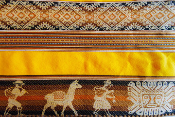 Close-up macro of fabric with Peruvian design