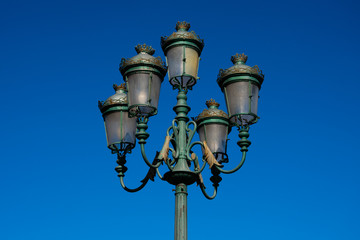 Fototapeta na wymiar Old street lamp on City Hall Square. Bilbao, Spain